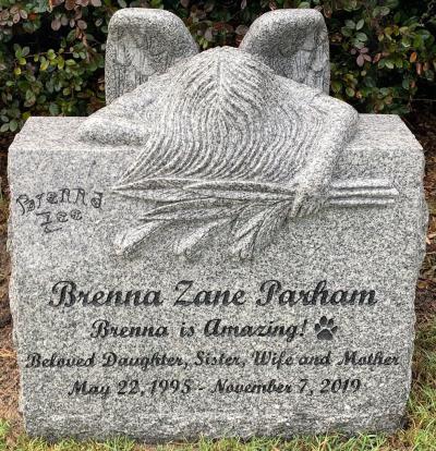 individual slant granite headstone with weeping angel 